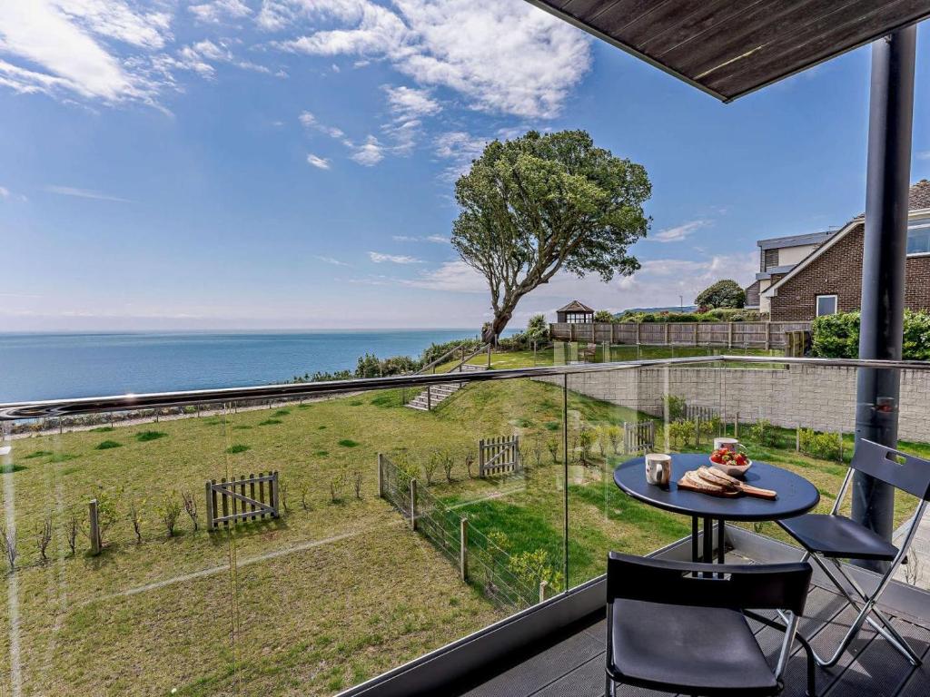 a view of the ocean from the balcony of a house at 2 Bed in Sandown oc-83617 in Sandown