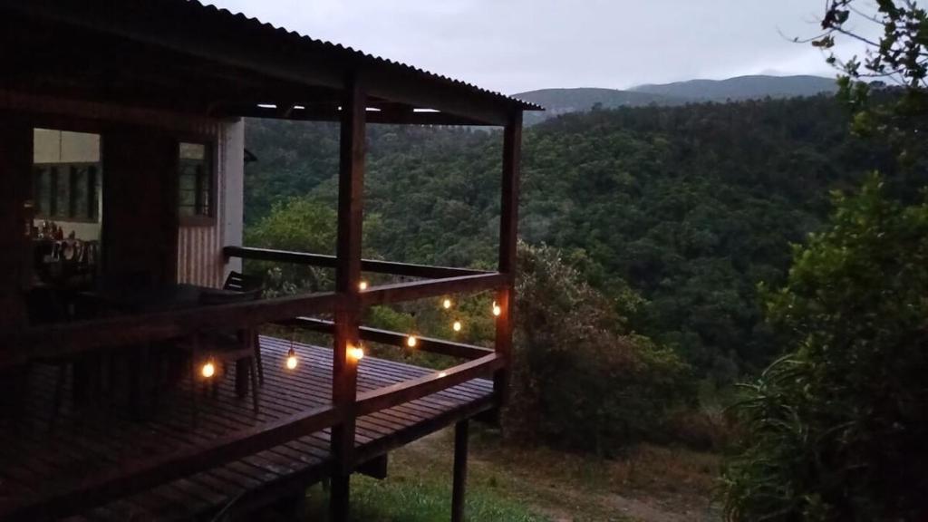 a porch of a house with lights on it at Rivendell Forest Retreat in Wilderness