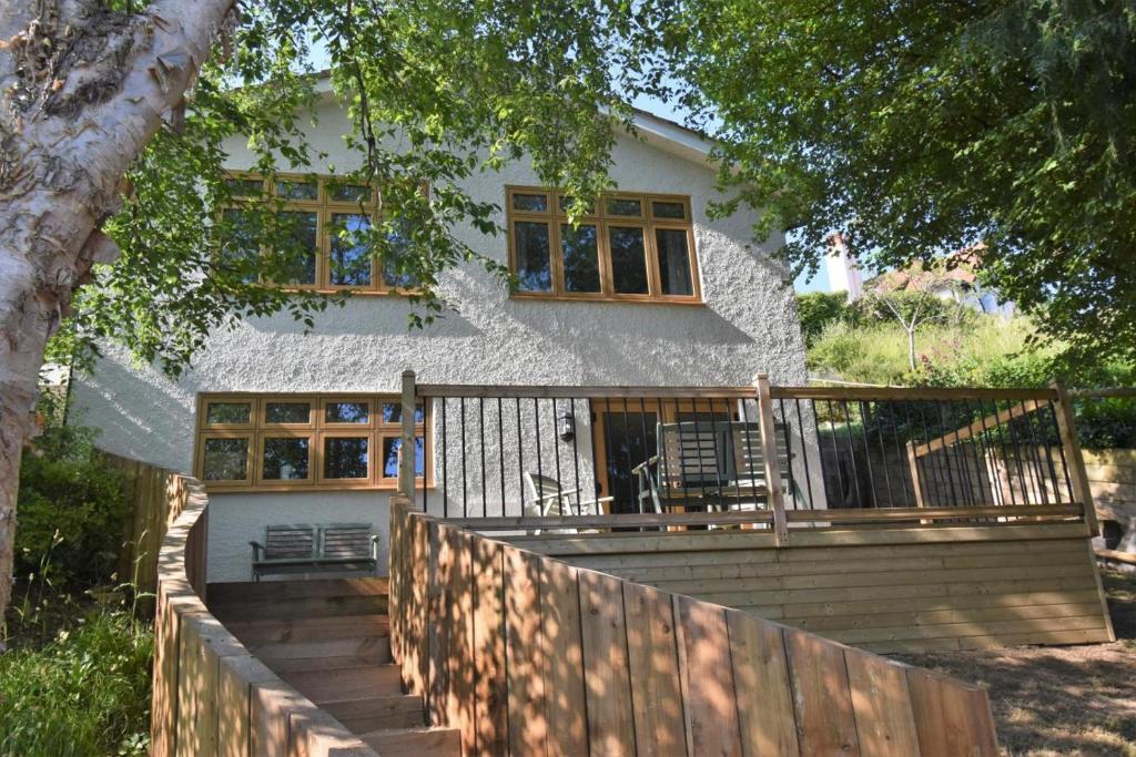 a house with a staircase in front of it at 2 Bed in Beer oc-s27769 in Beer