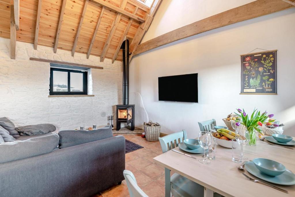 a living room with a couch and a table at 2 Bed in Clevedon oc-t30786 in Clevedon