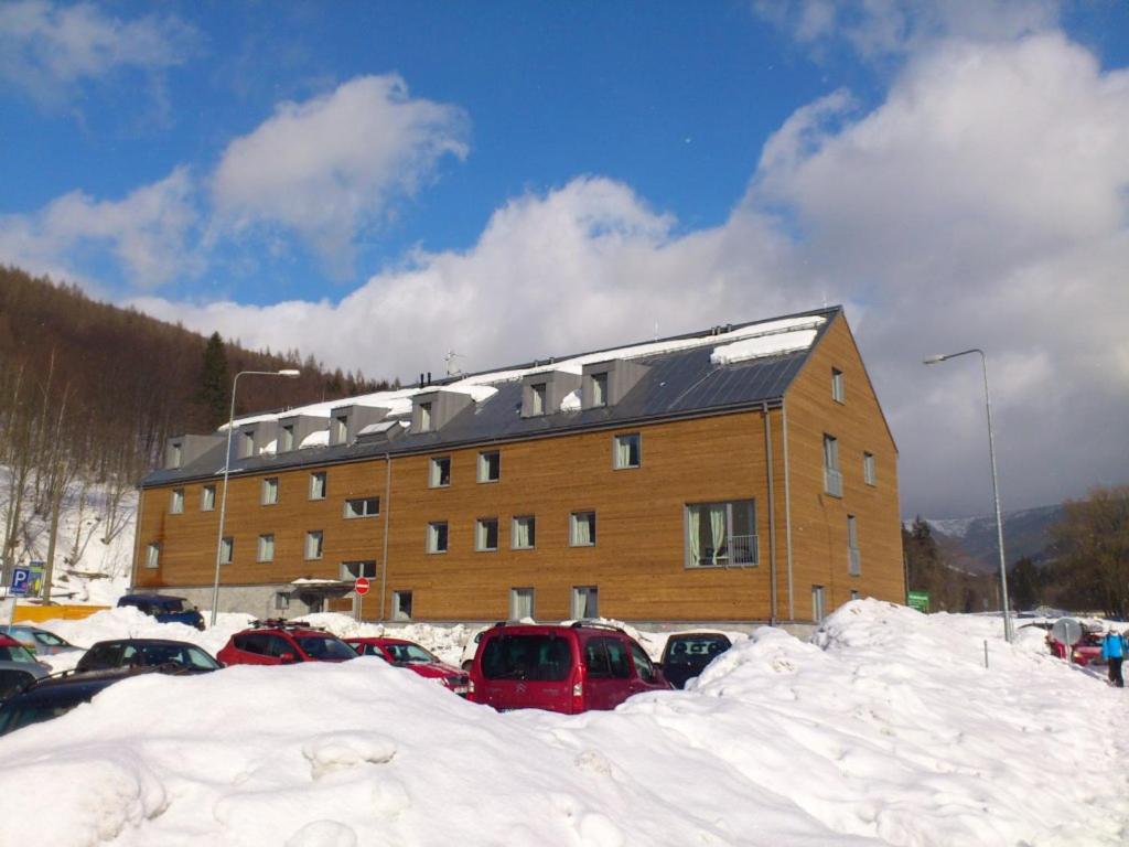 Luxusní horský apartmán přímo u sjezdovky Kouty v zimě