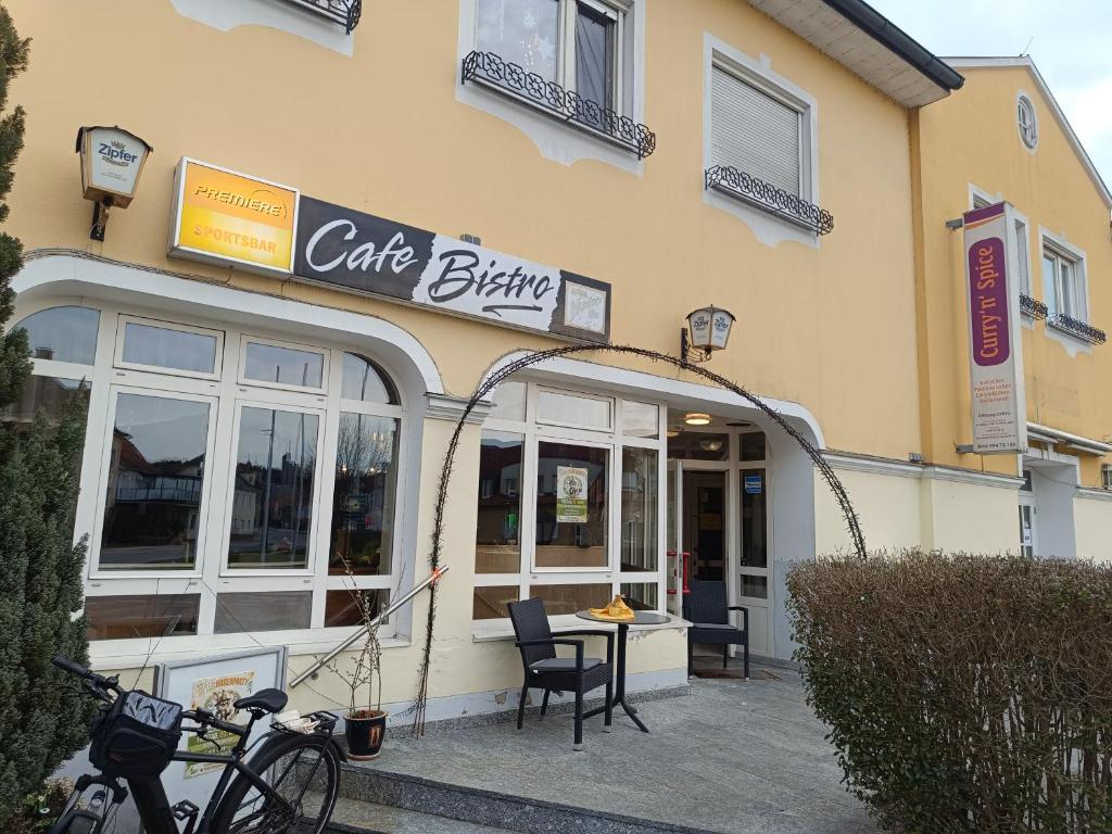 a cafe bike parked outside of a building at Double Room Stegersbach in Stegersbach