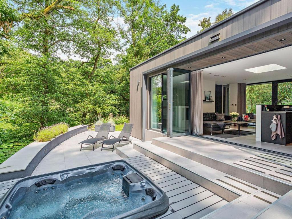 a house with a hot tub on a deck at 2 Bed in Skipton oc-86230 in Elslack
