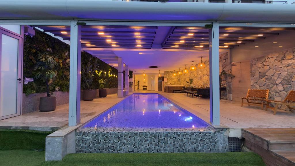 a swimming pool in the middle of a house at וילה סירקל - Villa Circle in Safed