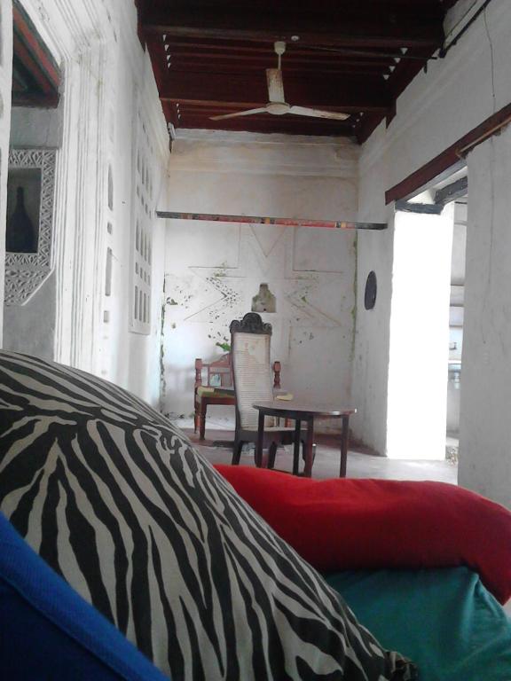 Postel nebo postele na pokoji v ubytování Jannat House