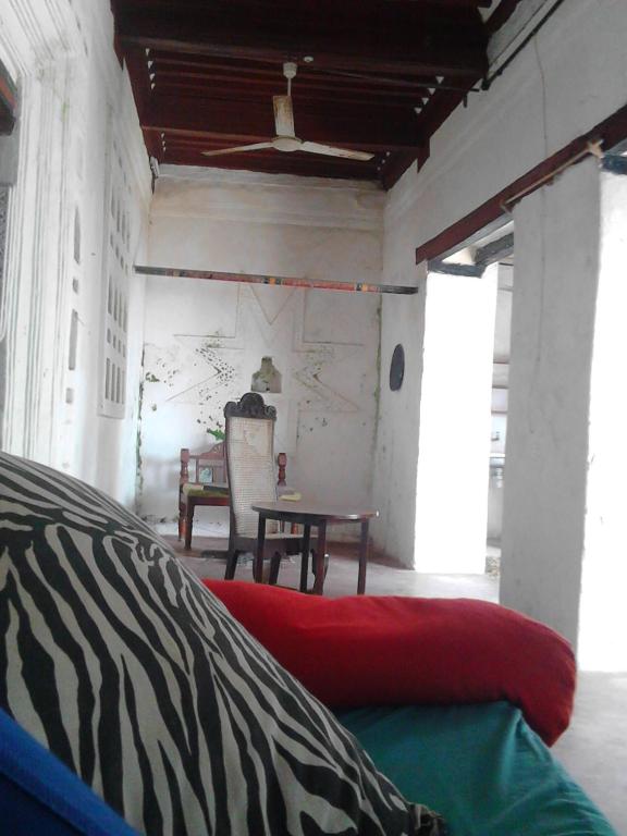 Postel nebo postele na pokoji v ubytování Jannat House
