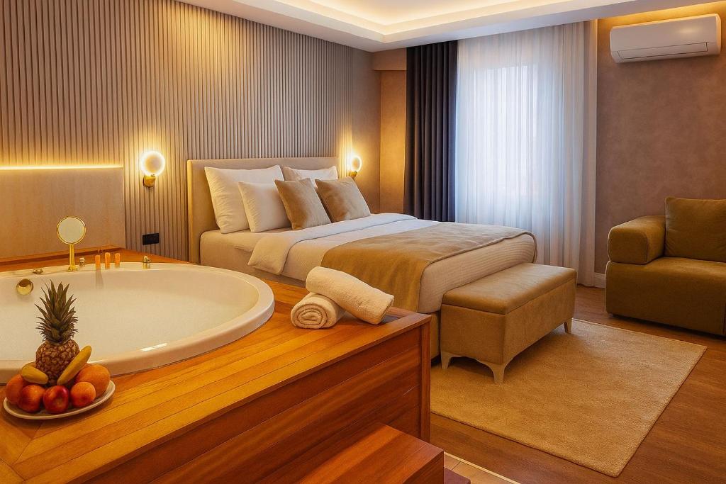 Llit o llits en una habitació de Optimal Hotel
