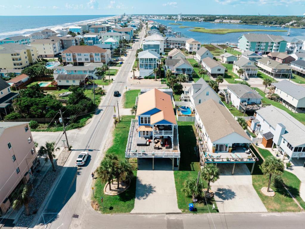 an aerial view of a beach town with houses at Paws and Relax! in Carolina Beach