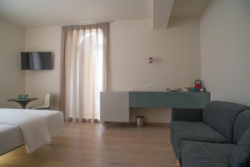 TV a/nebo společenská místnost v ubytování Verona Design