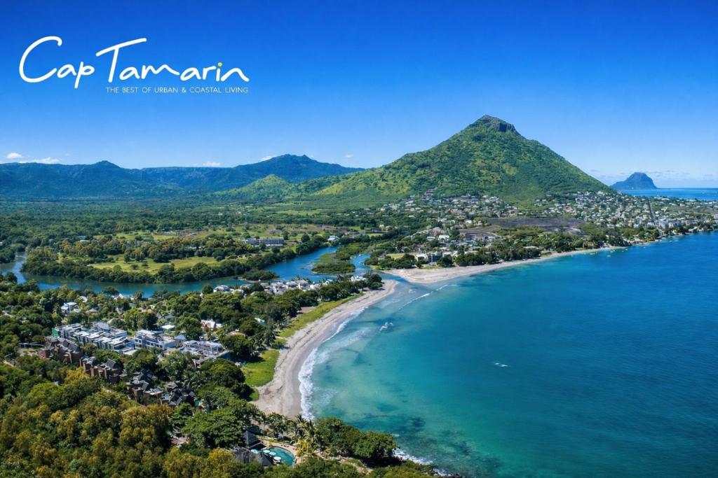 an aerial view of a beach with a resort at Opatio residence 1314 in Tamarin