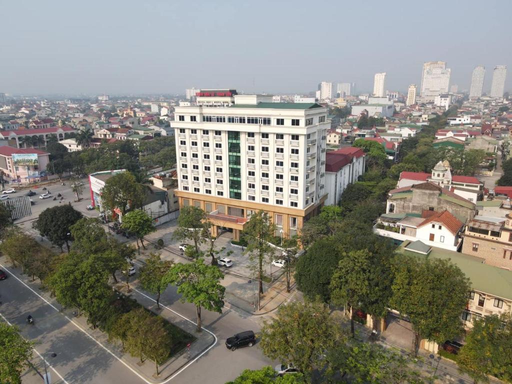 an overhead view of a city with a tall building at Nhà khách Bông Sen in Vinh