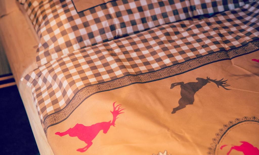 Postel nebo postele na pokoji v ubytování JoSchi Almhütte Hochkar