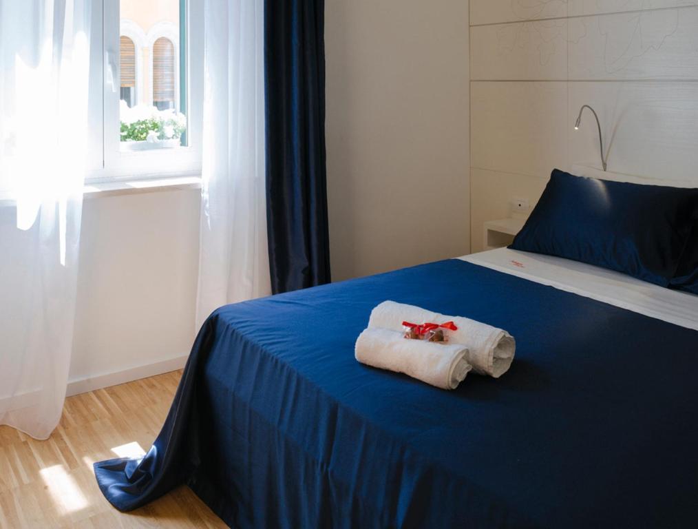 Posteľ alebo postele v izbe v ubytovaní Maison Fleurie