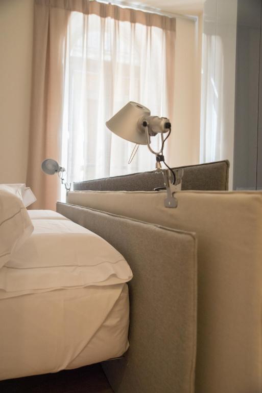 Postel nebo postele na pokoji v ubytování Verona Design