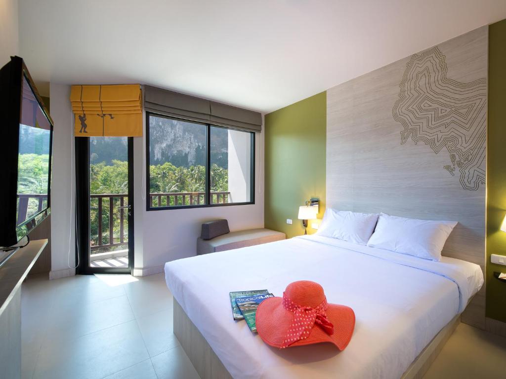 Postel nebo postele na pokoji v ubytování ibis Styles Krabi Ao Nang