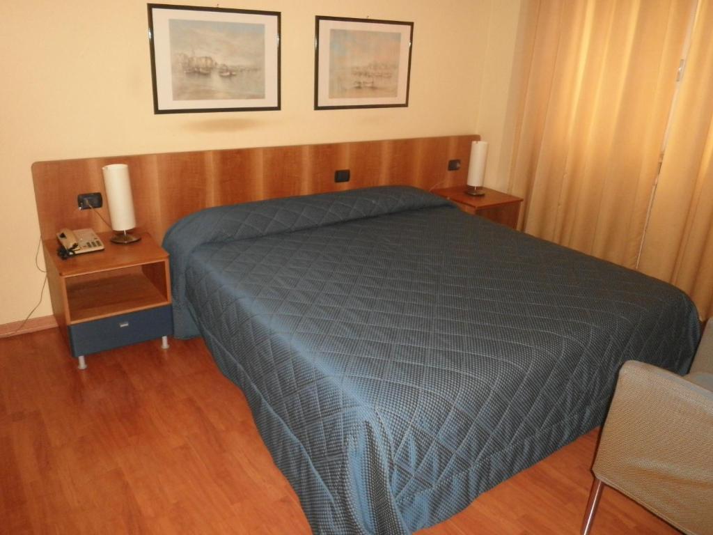 Postel nebo postele na pokoji v ubytování Hotel Selide