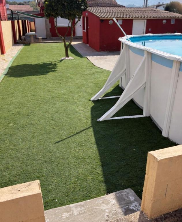 a pool table in the backyard of a house at La calma de Aisheric in Nigrán
