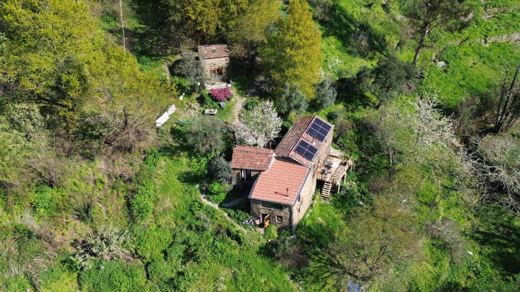 an aerial view of a house on a hill at Quinta WOW in Benfeita