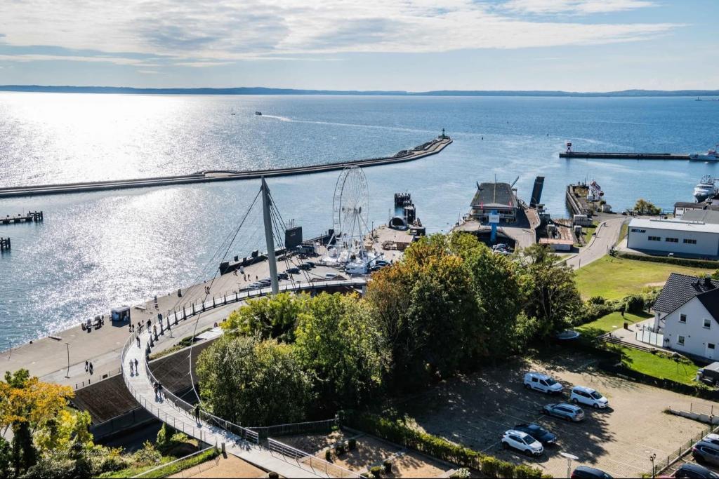 a bridge over a body of water with a pier at Ferienwohnung oberhalb vom Hafen 1 in Sassnitz