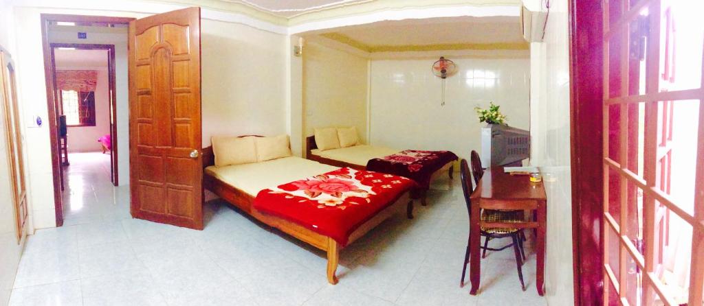 Postel nebo postele na pokoji v ubytování Hoa Phuong Guesthouse