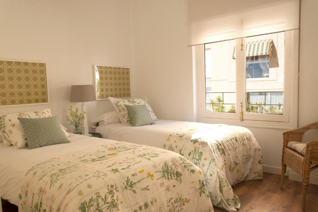 Posteľ alebo postele v izbe v ubytovaní Living4Malaga Monte Sancha Deluxe View