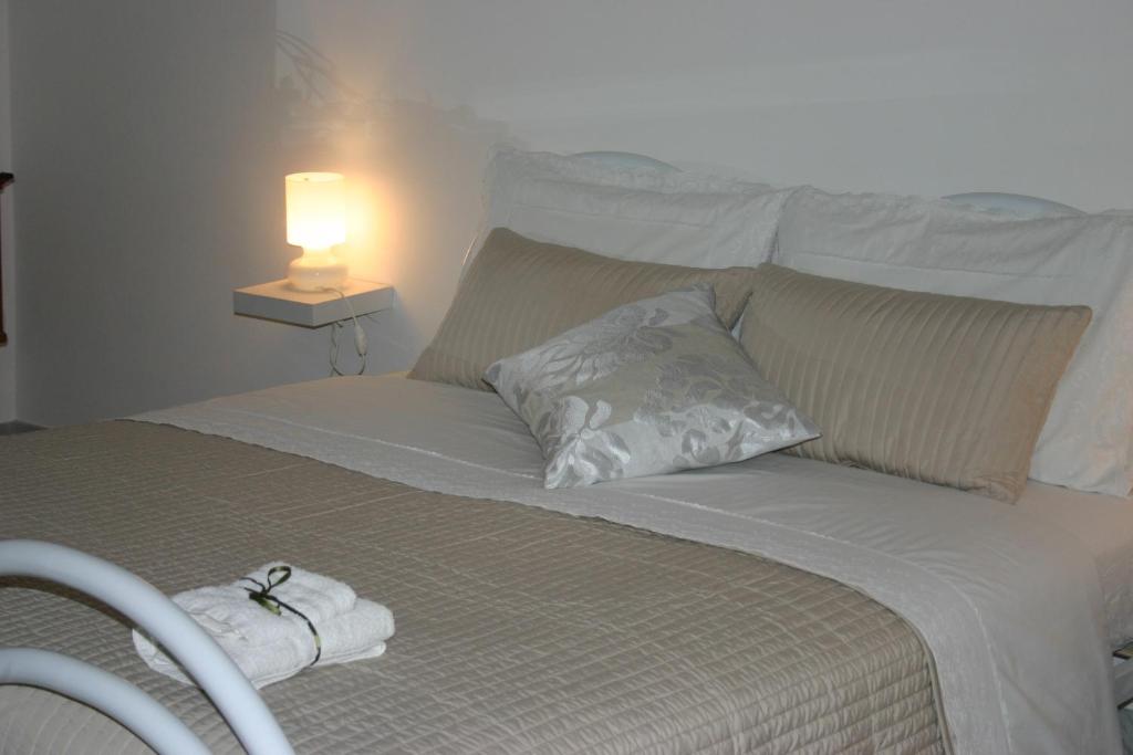 Postel nebo postele na pokoji v ubytování B&B Dimora Lucia e Dalila