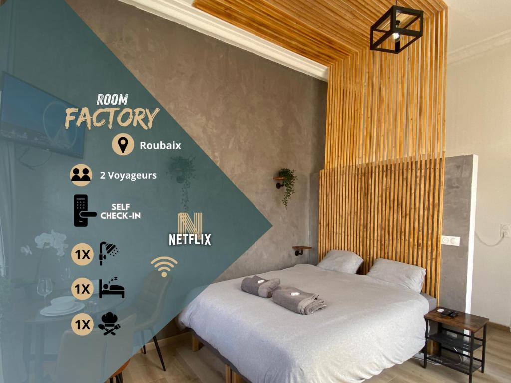 a bedroom with a bed with a sign on the wall at Roubaix Lille private shower & Netflix in Roubaix