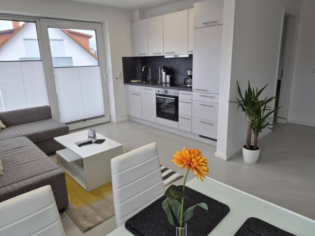 a living room with a couch and a table at Wohnung in Dahme