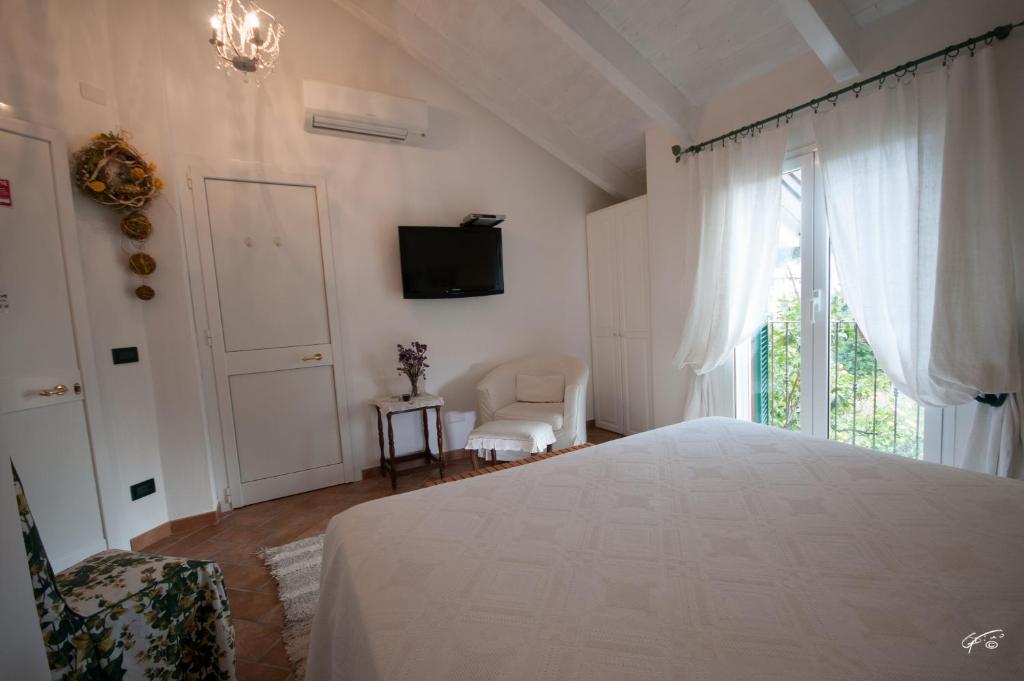 Posteľ alebo postele v izbe v ubytovaní Guest House Arancia145