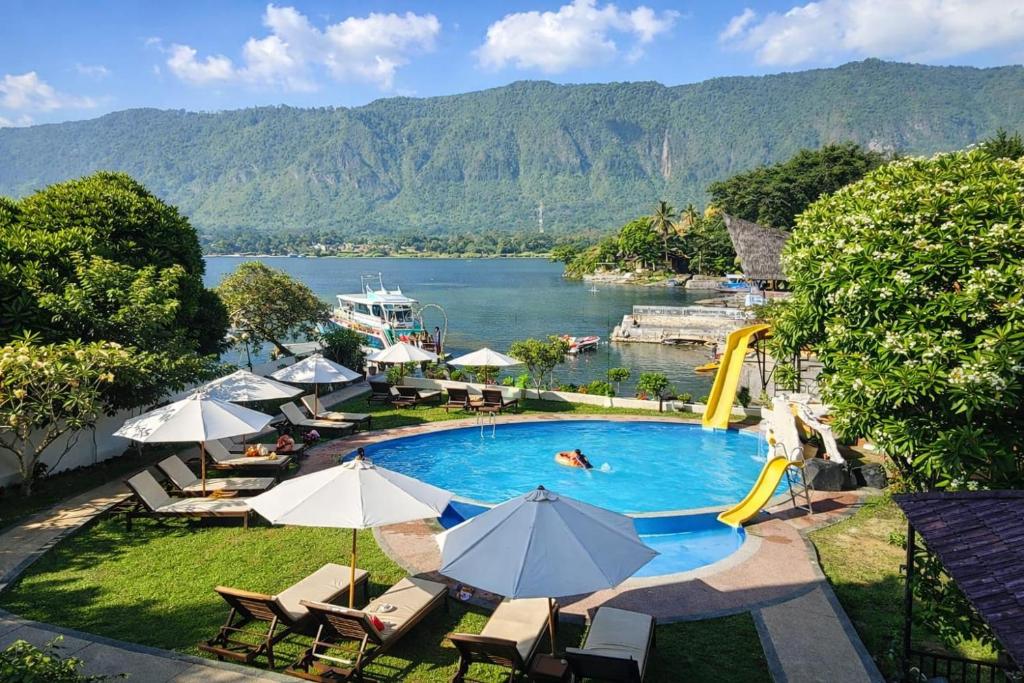 Zoé’s Paradise Waterfront Hotel - Housity