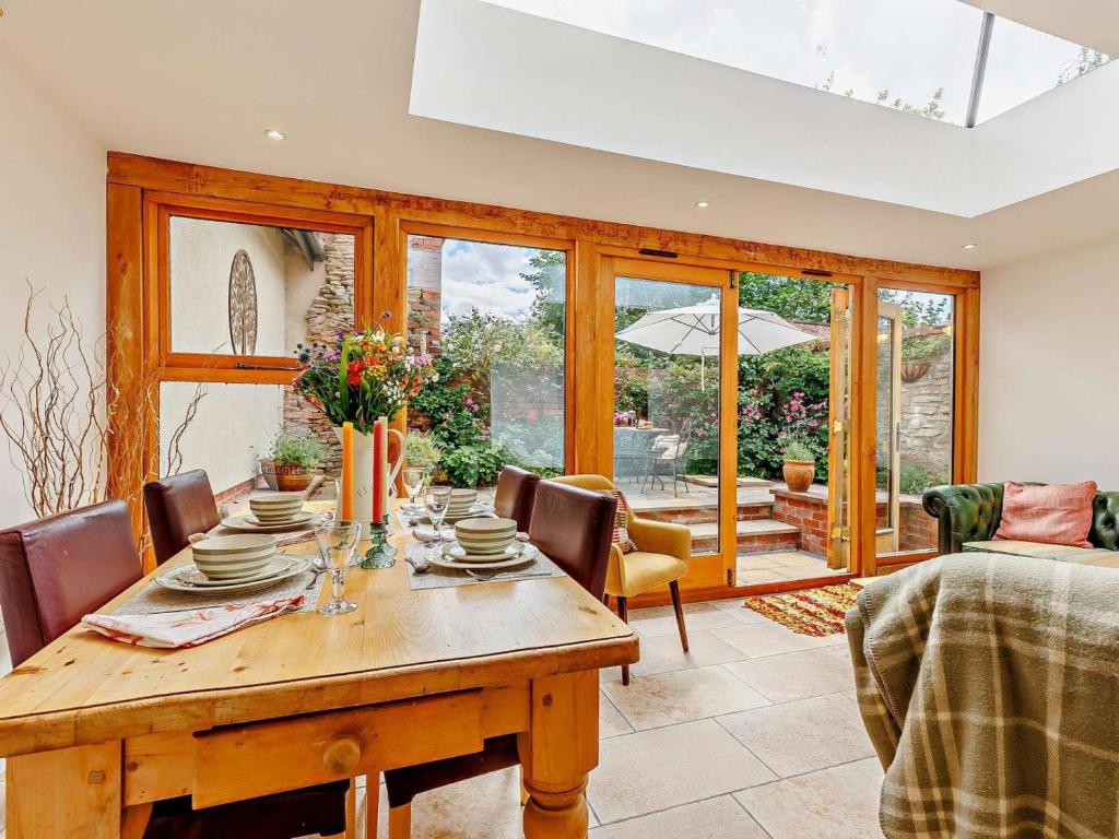 a dining room with a wooden table and chairs at 2 Bed in Ludlow oc-40329 in Ludlow