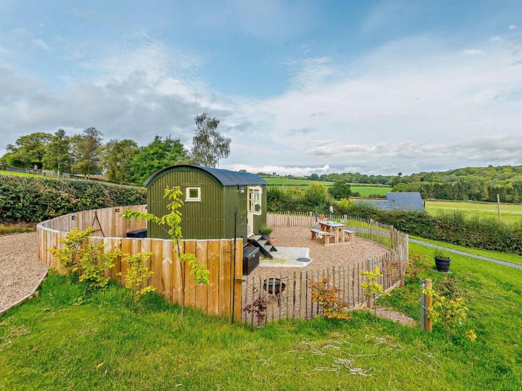 a tiny house in the middle of a yard at 1 Bed in Hereford oc-93440 in Little Dewchurch