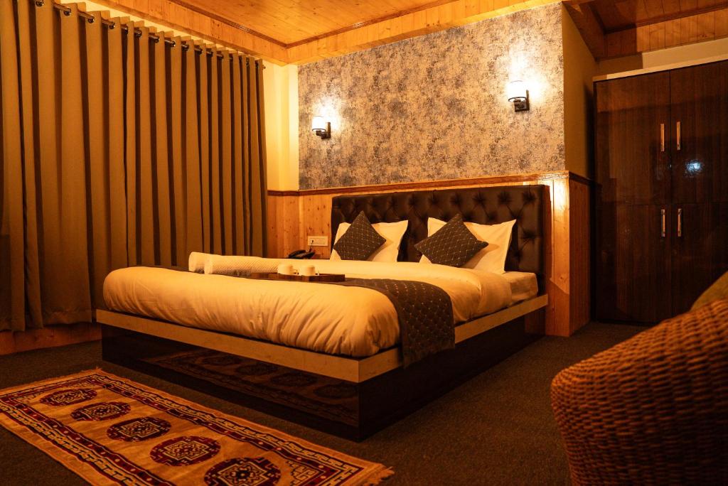 a bedroom with a bed in a room at The Lume, Lachung in Lachung