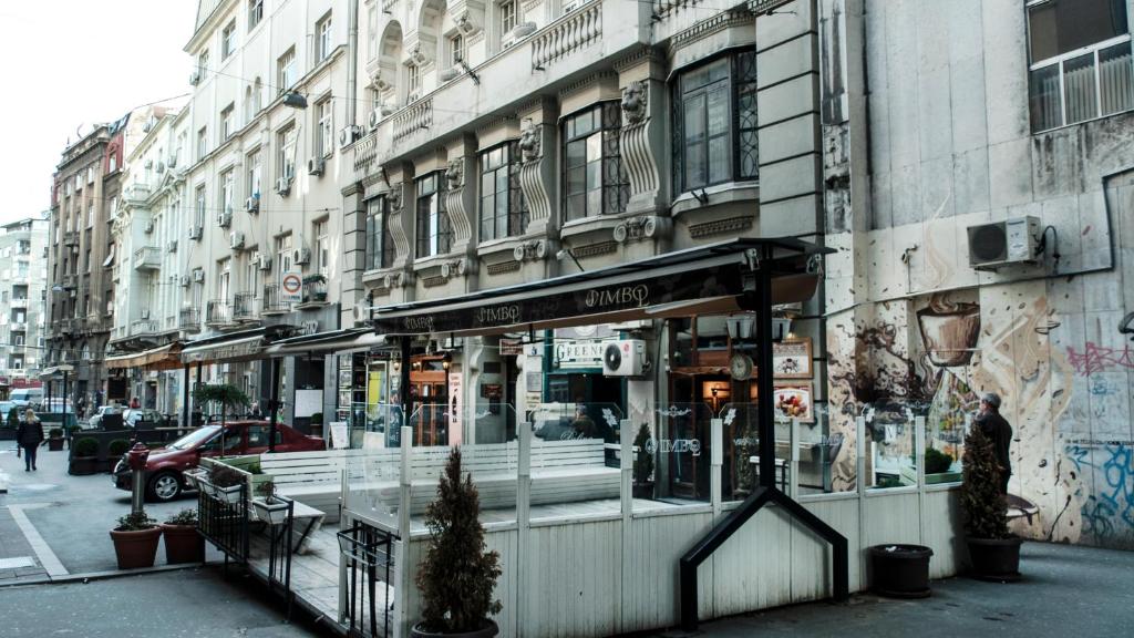 a store front of a building on a city street at AMN Center Apartment in Belgrade