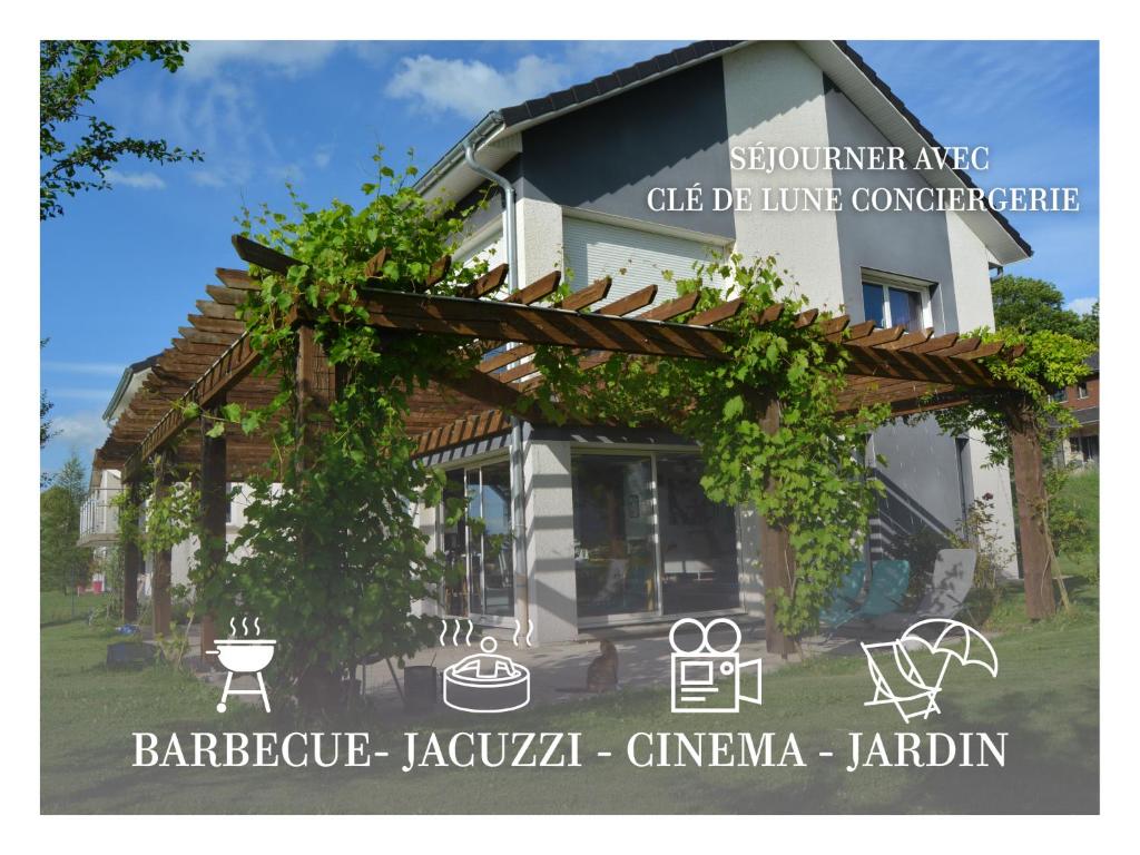 a building with a sign for a furniture store at Villa du Val d'Usiers in Bians-les-Usiers