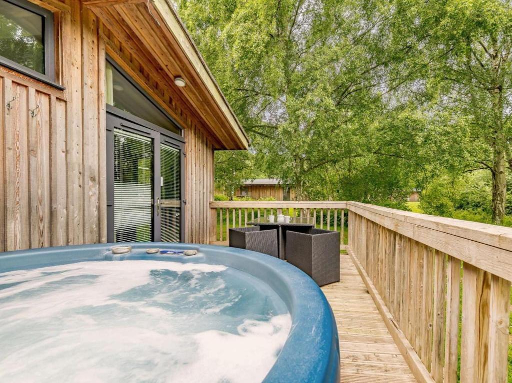 a hot tub on the deck of a house at 2 Bed in Newark oc-88428 in Walesby