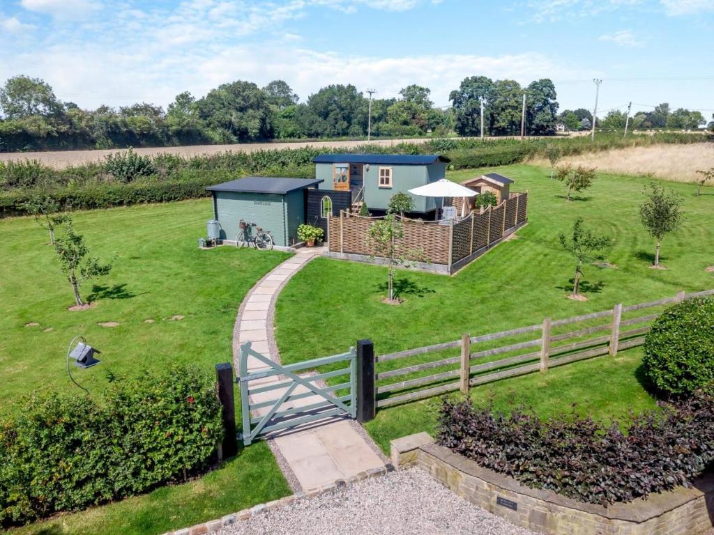 an aerial view of a tiny house in a field at 1 Bed in Leominster oc-93060 in Pembridge