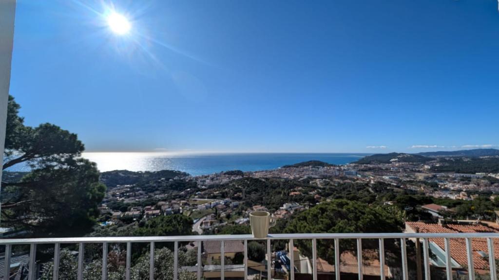 a view of the ocean from the balcony of a house at Tutto Passa Lloret in Lloret de Mar