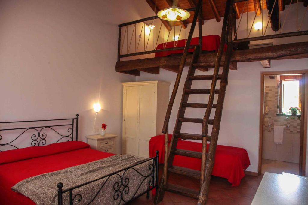 Postel nebo postele na pokoji v ubytování Agriturismo Galea