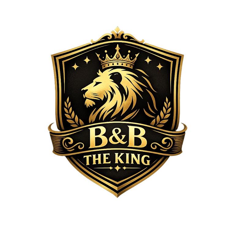 a crest with a lion with a crown and the words bc the king at B&B The King in Acconia