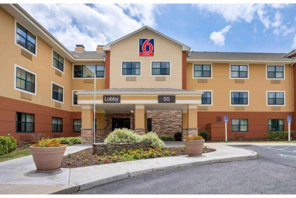 a hotel with a sign on the front of it at Studio 6 Extended Stay Fishkill Westage Center NY in Fishkill