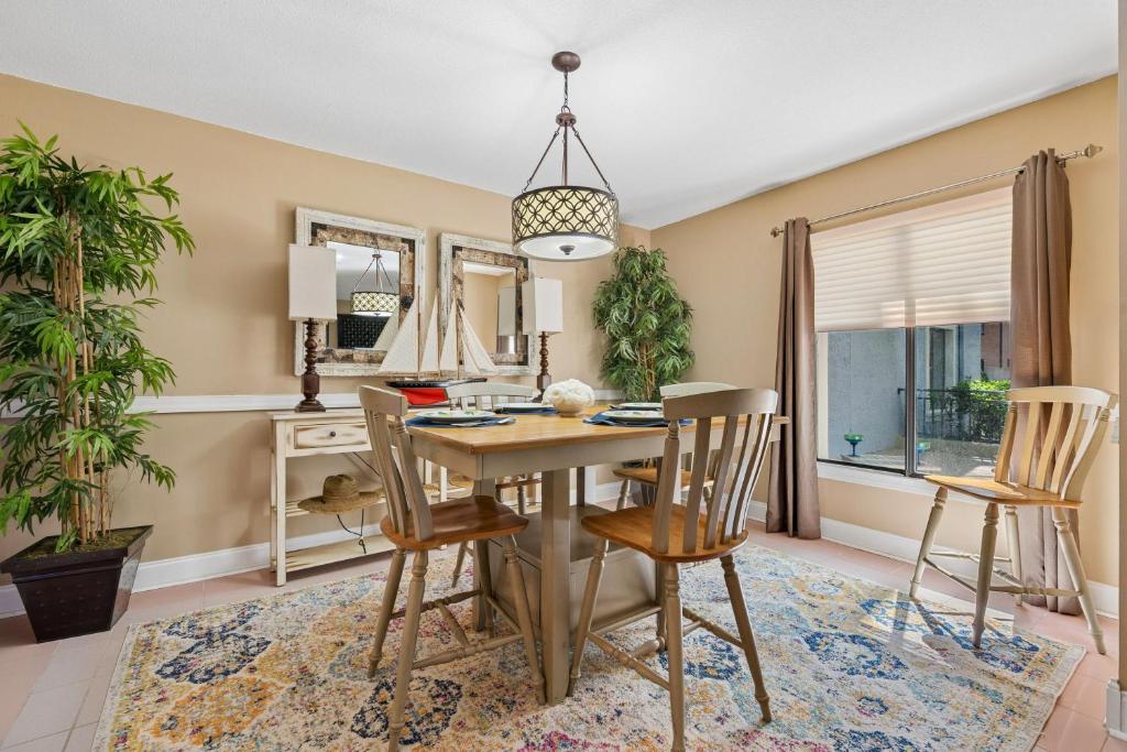 a dining room with a table and chairs at 803 Clipper Court in Hilton Head Island