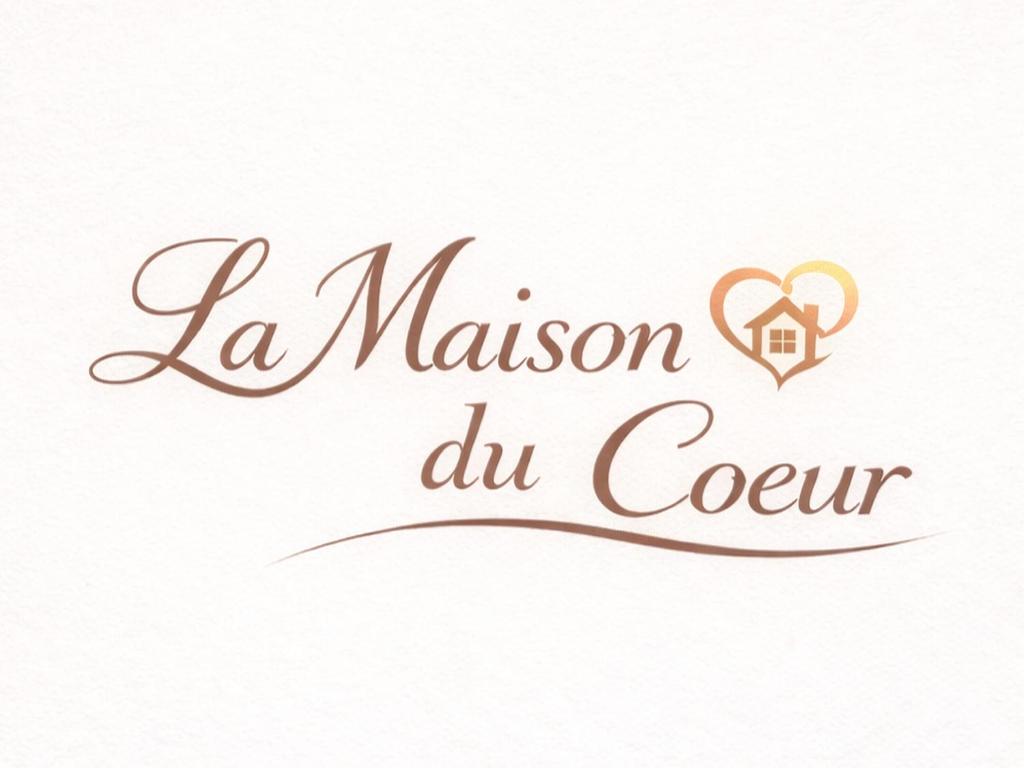 a sign that reads la mason dvd cove with a heart at La Maison du Coeur in Bari