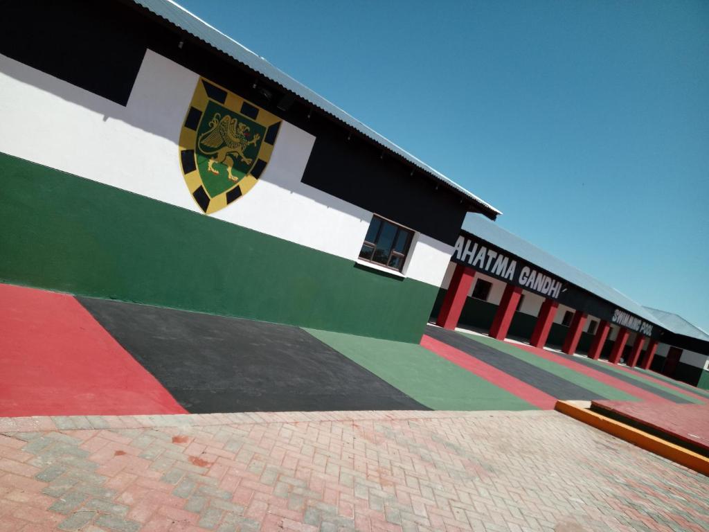 a building with a mural on the side of it at Kimberly in Goodwood