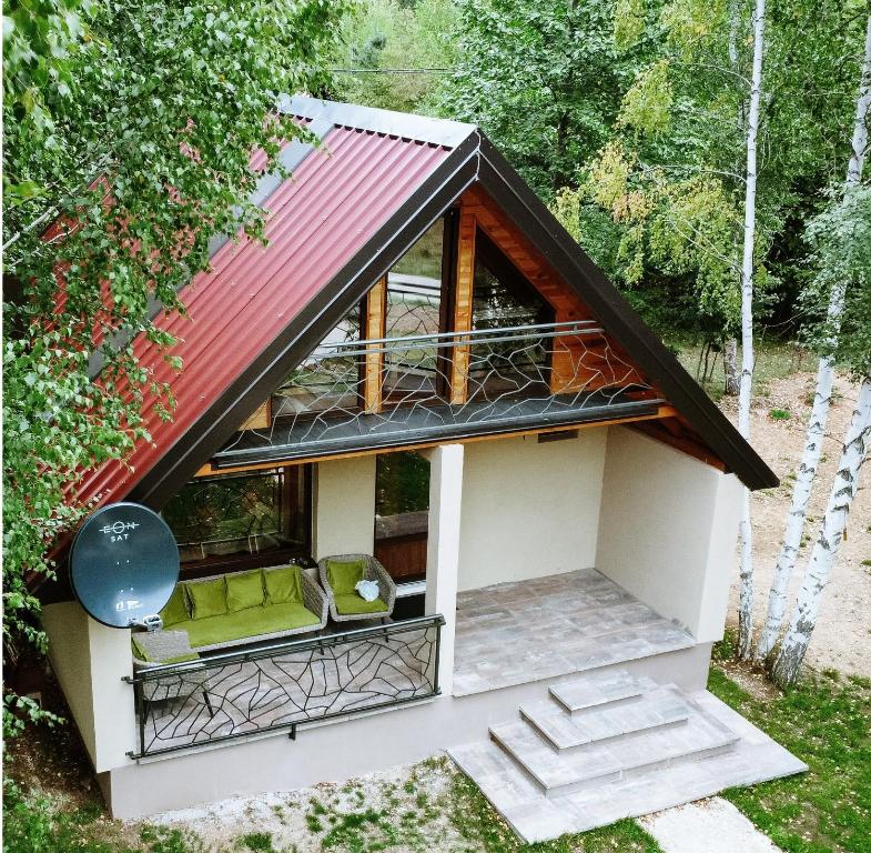 a small house with a red roof at Mountain rest Brezna in Plužine