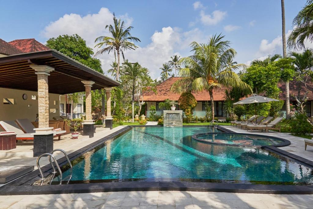 an image of a swimming pool at a villa at Rossa Garden Hotel Boutique in Candidasa