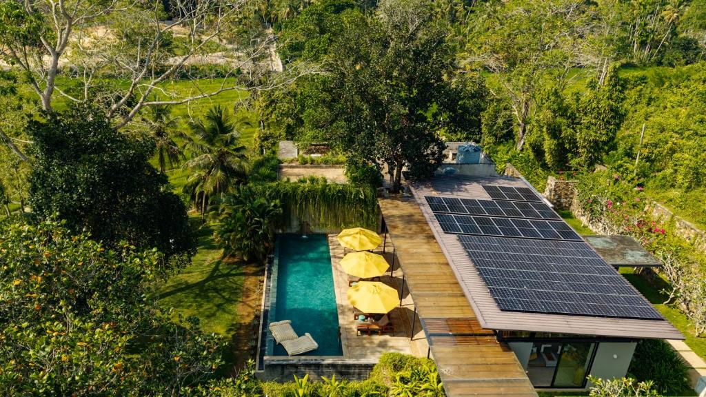 an overhead view of a house with solar panels on the roof at Villa Alba - Ahangama in Ahangama