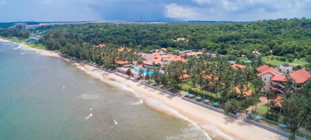 an aerial view of a resort on a beach at Golden Coast Resort & Spa in Phan Thiet