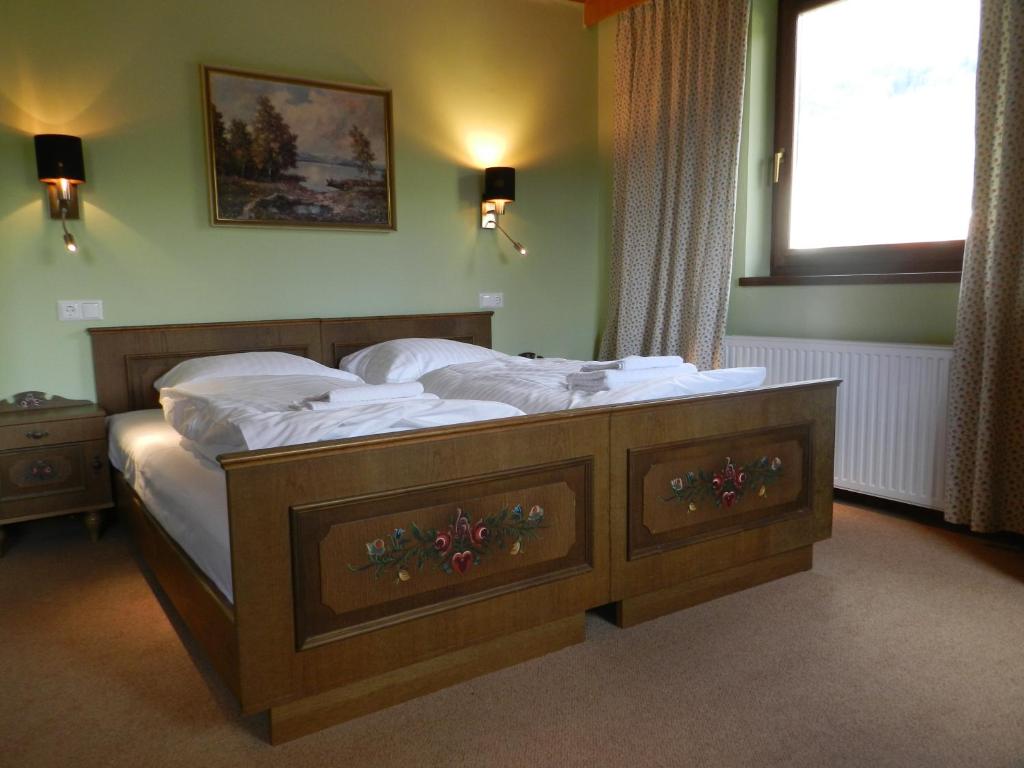 Postel nebo postele na pokoji v ubytování Locus Malontina Hotel