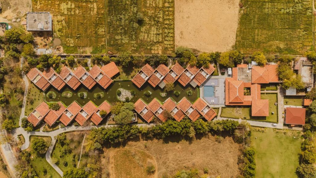 an overhead view of a group of houses with roofs at Brij Bageecha, Jaipur - IHCL SeleQtions in Jaipur